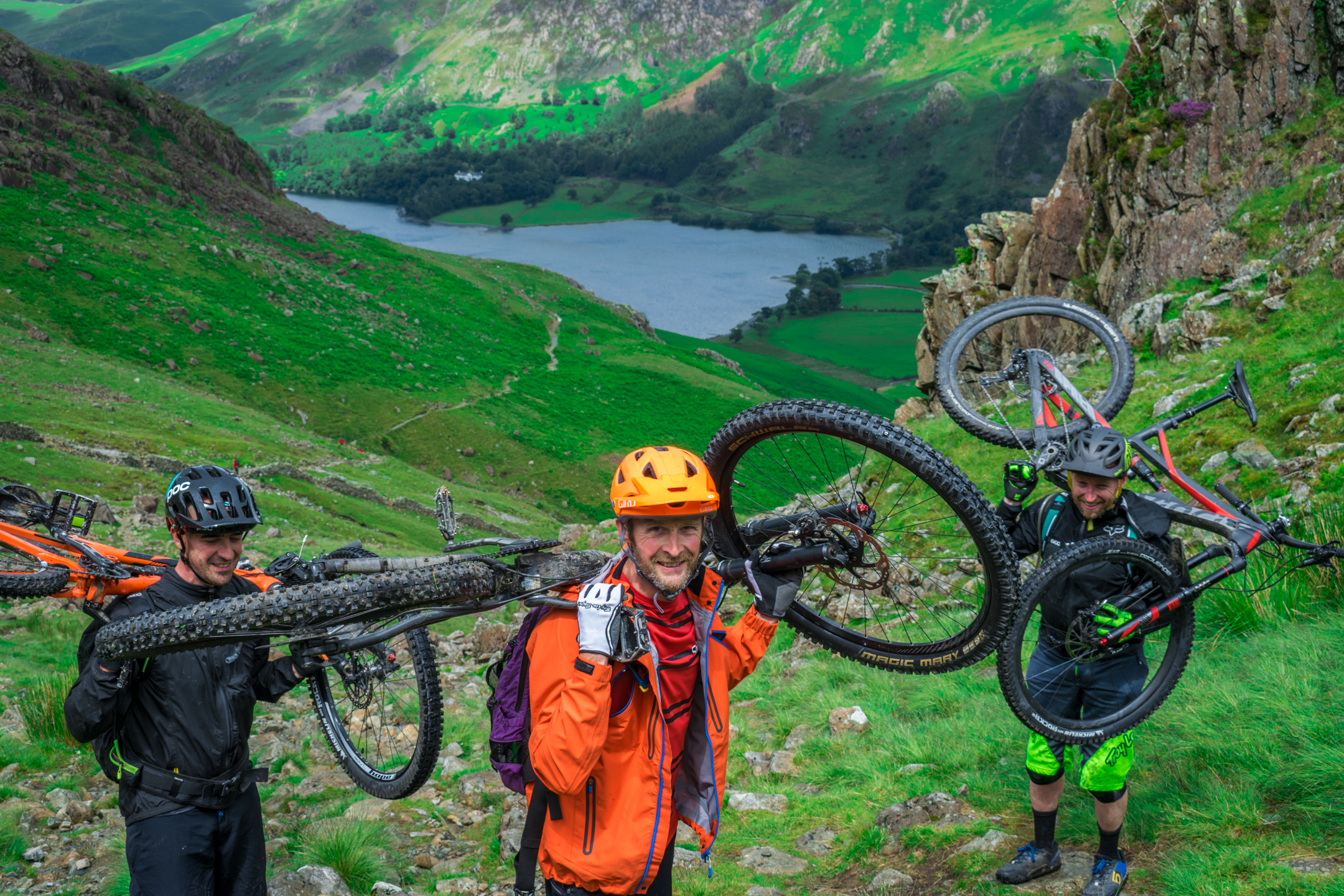 Mountain bikes being carried up Haystacks.